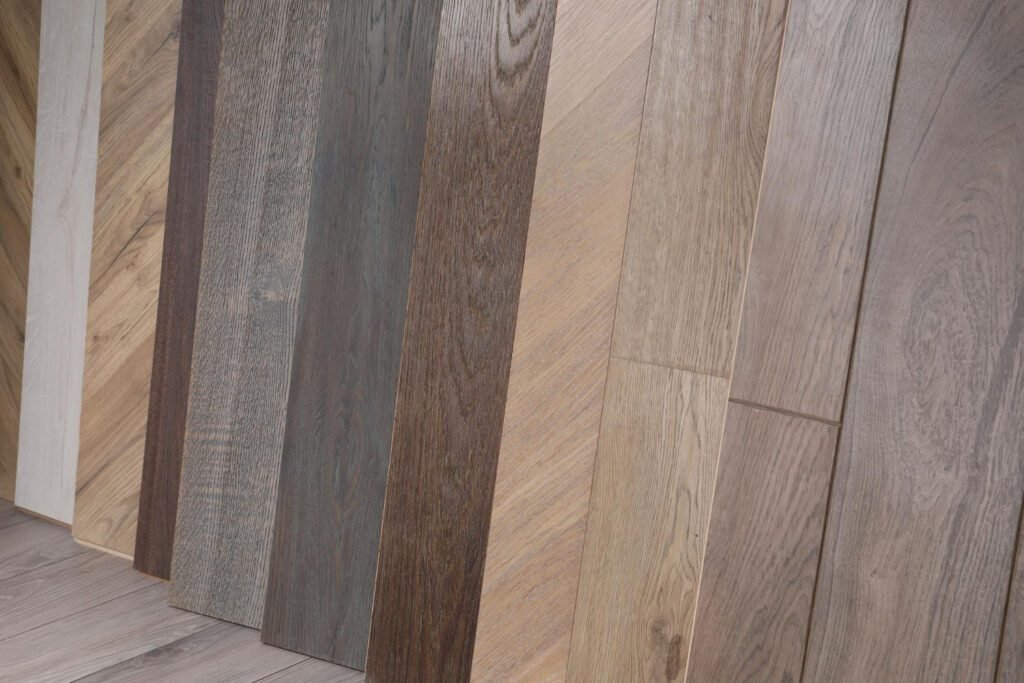 flooring types comparison side by side wood laminate SPC
